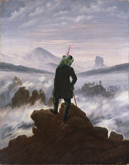 A man in a green coat stands on a rocky outcrop, gazing out over a misty mountain valley while holding a small pink and white flag. The image, reminiscent of Caspar David Friedrich's "Wanderer above the Sea of Fog," visually mirrors the caption's lone, triumphant figure surveying the landscape—evoking the solitary confidence of a crypto trader who has "made it," with no other people visible in the scene.