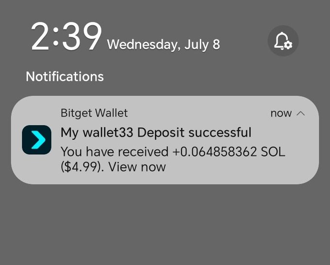 A smartphone lock screen notification from Bitget Wallet at 2:39 on Wednesday, July 8, stating 'My wallet33 Deposit successful - You have received +0.064858362 SOL ($4.99).'