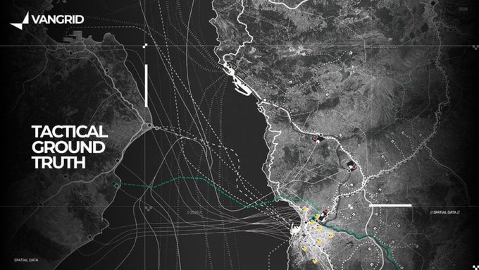 A black-and-white satellite map from VanGrid displays "TACTICAL GROUND TRUTH" with yellow dots marking data points across a coastal region, visually representing the company's real-time geospatial intelligence for dynamic environments like warehouses, construction sites, and roads. The imagery reinforces the post's message about Physical AI requiring fresh, location-based data from constantly changing spaces.