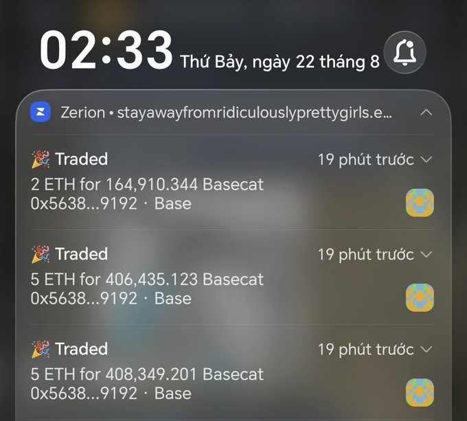 A phone lock screen notification showing the time 02:33 on Saturday, August 22nd, displaying Zerion wallet trade alerts for large ETH to Basecat swaps on the Base network.