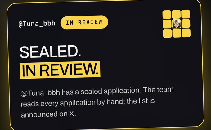 A dark-themed digital card for user '@Tuna_bbh' displaying 'SEALED. IN REVIEW.' status, indicating a sealed application being reviewed by the team.
