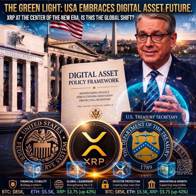 A promotional graphic headlined 'THE GREEN LIGHT: USA EMBRACES DIGITAL ASSET FUTURE' shows a man in a suit labeled 'U.S. Treasury Secretary' alongside a 'DIGITAL ASSET POLICY FRAMEWORK' document, with XRP, Federal Reserve, and Treasury seals, and prices listed: BTC $85K, ETH $5.5K, XRP $3.75 (up 42%).