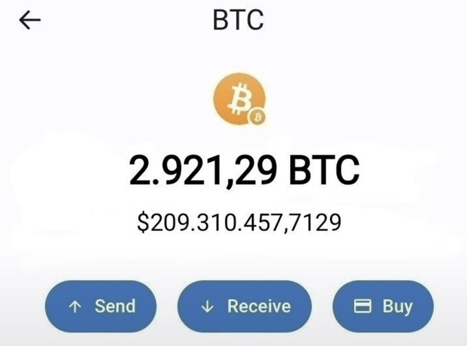 A screenshot of a Bitcoin (BTC) wallet displaying a balance of 2.921,29 BTC (~$209 billion), used to promote a giveaway promising 0.1 BTC (~$8,000) to a random follower who likes, reposts, and comments "good."