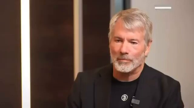 The image features a man wearing a black suit jacket with a white collar and a beard. He appears to be sitting down or standing behind a desk, possibly in an office setting. The caption of the image reads "Michael Saylor once said if Strategy sells bitcoin they will buy multiples more BTC than they sold: ?". This statement is likely referring to Michael Saylor's quote about Bitcoin, which suggests that he believed Bitcoin could be bought and sold multiple times for a profit.