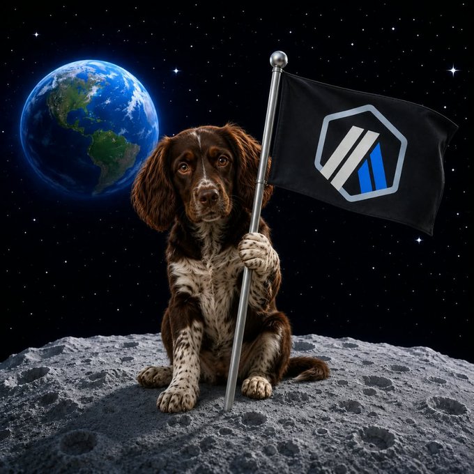 A digital artwork showing a brown and white dog sitting on the moon holding a flag with a blue and grey logo, with Earth visible in the starry background.