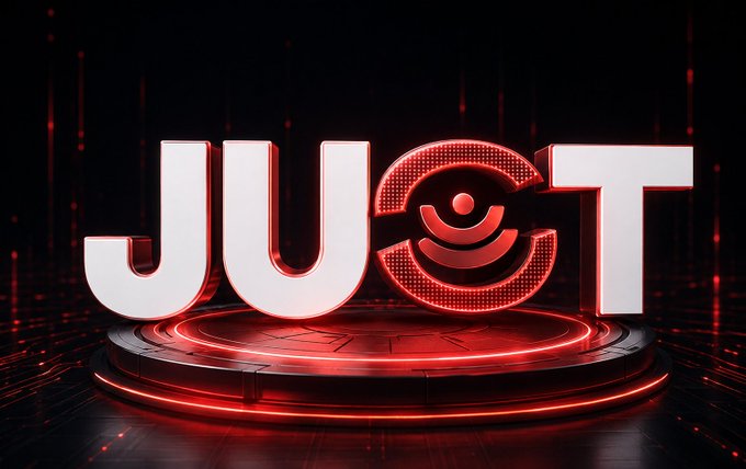 A futuristic 3D rendering displays the word "JUCT" in bold white letters on a glowing red circular platform, with the letter "C" stylized as a Wi-Fi/signal symbol. The image ties into the post's message about JustLend DAO by showcasing the platform's branding in a sleek, tech-forward design, reinforcing the user-friendly yet sophisticated nature of their DeFi lending interface.