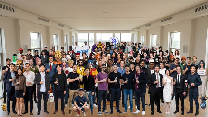 The image shows a large group of people standing together in front of a building, all wearing costumes or masks that cover their faces. The group appears to be posing for a photo, with some individuals holding drinks as if they are celebrating an event or achievement. The caption above the image reads "This isn' t just a project.. it' s an army of builders, creators, believers, and supporters moving in the same direction @injective is unstoppable." This suggests that the group might be part of a team or organization with a strong sense of unity and purpose.