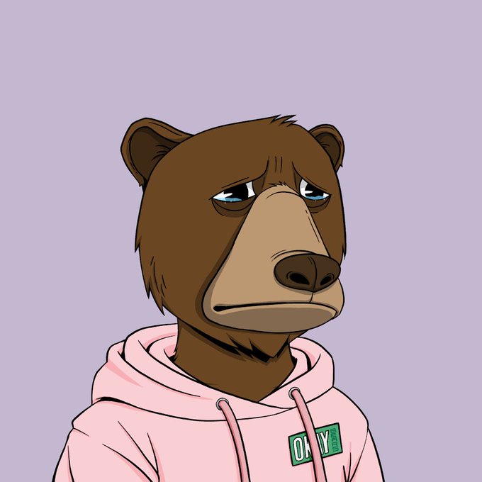 A digital illustration of a sad-looking brown bear wearing a pink hoodie with an 'O.X' logo, set against a plain light purple background.