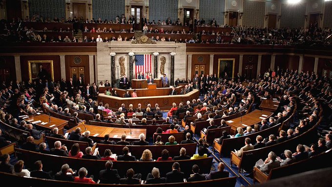 The image shows the U.S. House of Representatives chamber filled with members, with the American flag displayed at the speaker's podium and visitors watching from the gallery above. The accompanying post references an upcoming vote on the Clarity Act, suggesting the chamber is gathered in anticipation of this legislative decision.