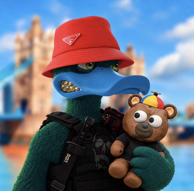 A 3D-rendered anthropomorphic duck character wearing a red bucket hat and black tactical vest holding a small teddy bear, with a blurred castle and water in the background.
