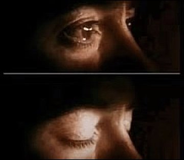 The image shows a close-up of two faces, one with eyes closed and another with eyes open. Both faces are darkly lit, creating an atmosphere of mystery or intrigue. The caption below the image reads "we will see this again soon.. $SOL". This suggests that there might be more content related to the image in the future, possibly involving a similar scene or concept.