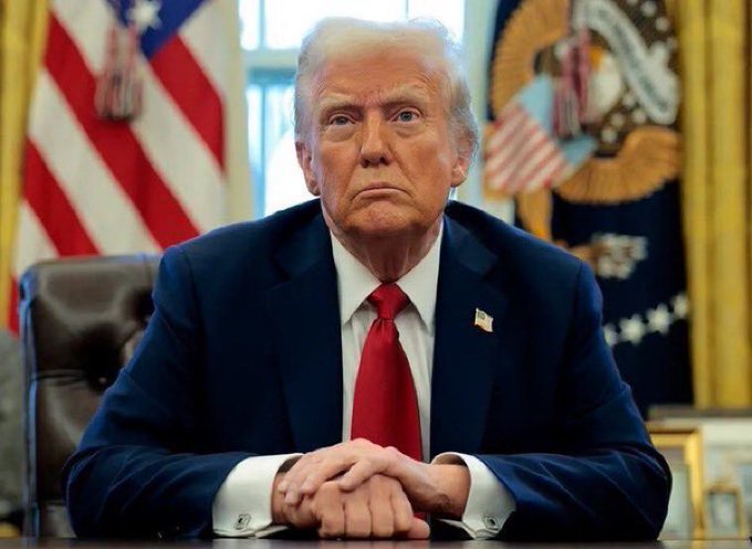 President Trump is shown seated at a desk in the Oval Office, with the American flag in the background, emphasizing the context of the "CLARITY Act" mentioned in the post.