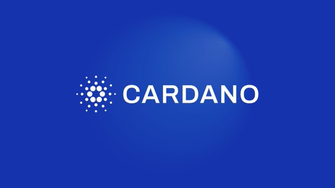 The image displays the white "CARDANO" logo and its distinctive dotted emblem centered on a solid blue background, representing the Cardano blockchain platform. This branding aligns with the post about the Cardano Foundation hosting a governance workshop in Tokyo with DReps and community members to discuss improving Cardano's governance efficiency.