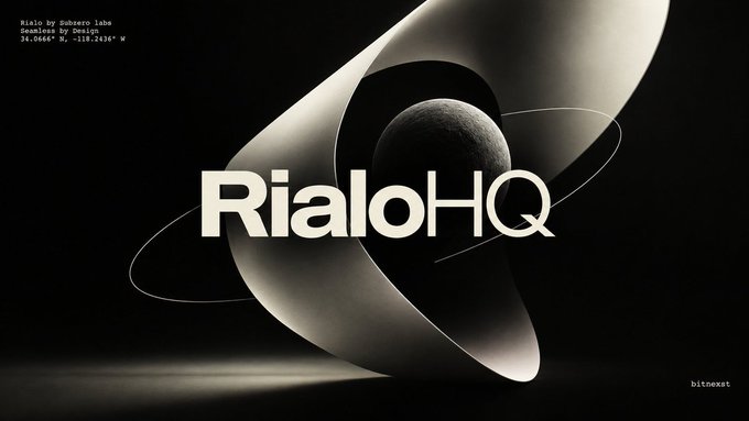 A stylized 3D rendering of a planet with rings, featuring the text 'RialoHQ' prominently in the center, credited to 'Rialo by Subzero Labs' in the upper left.