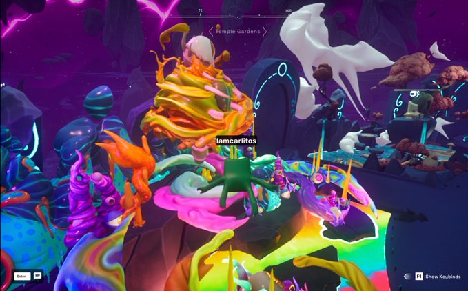 A vibrant, psychedelic 3D digital environment labeled 'Temple Gardens' shows a character named 'lamarlitos' surrounded by colorful, swirling forms, glowing creatures, and abstract shapes.