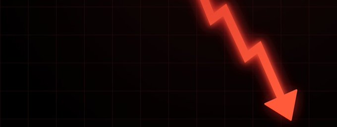 Simple graphic showing a red downward-trending zigzag arrow on a black grid pattern, representing a market decline or crash.