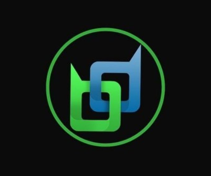 A circular logo with a green border containing interlocking, abstract 3D green and blue shapes on a black background.