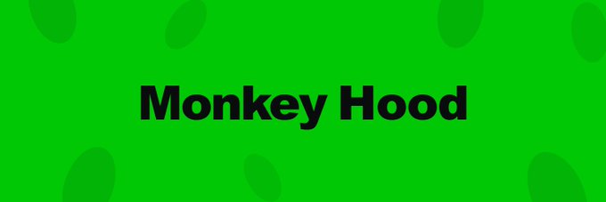 The image displays the text "Monkey Hood" in bold black lettering against a bright green background with subtle oval patterns. It serves as a branded graphic for the @MonkeyHoodNFT giveaway promotion, visually identifying the partner NFT project involved in the contest.