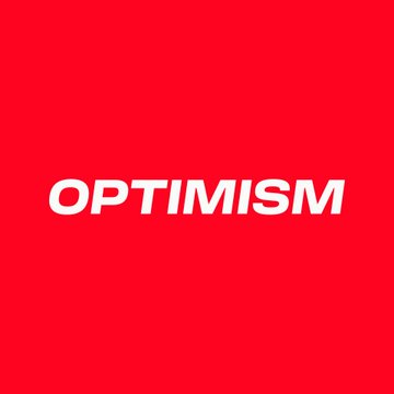 The image displays the word "OPTIMISM" in bold white capital letters against a solid red background, visually reinforcing the article about Optimism's governance vote to redirect 546.9M OP tokens (~$49.7M) from future user airdrops to a Strategic Ecosystem Fund.
