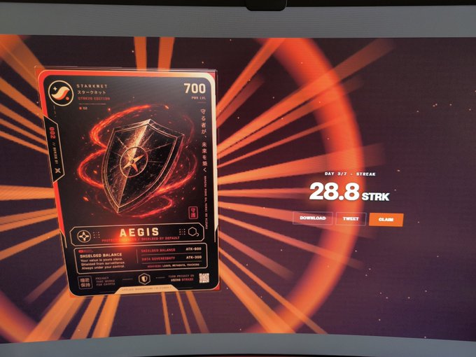 A digital trading card for 'STRIKE AEGIS' on the Stargnet Strike Edition platform, showing a 700 PRK value with a streak of 28.8 STRK on day 3/7.