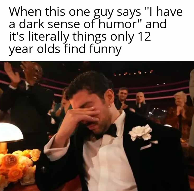 A meme with text reading "When this one guy says 'I have a dark sense of humor' and it's literally things only 12 year olds find funny" above an image of Adam Sandler facepalming in a tuxedo while people laugh behind him.