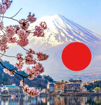 A scenic view of Mount Fuji with cherry blossoms in the foreground, Lake Kawaguchi, and a Japanese cityscape, overlaid with a red sun graphic resembling the Japanese flag.