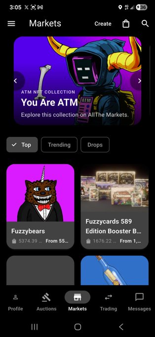 A screenshot of a mobile 'Markets' page on what appears to be an NFT platform (OpenSea), featuring an ATM NFT Collection banner ('You Are ATM') and trending collections including 'Fuzzybears' and 'Fuzzycards 589 Edition Booster B...'.