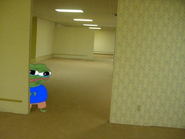 A cartoon frog wearing a blue shirt and green cap peeks out from behind a wall into a long, empty room with patterned wallpaper and fluorescent lighting.