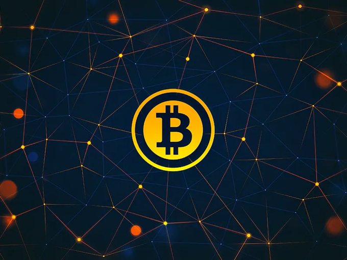 The image features an abstract background with a large yellow Bitcoin symbol at its center surrounded by numerous small orange lines. The text "Crypto right now feels less like a market and more like a digital movement evolving in real time." suggests that the Bitcoin symbol is associated with a current state of rapid growth or development within the cryptocurrency world, possibly indicating an ongoing transition from traditional financial systems to a more decentralized, digital-focused economy.
