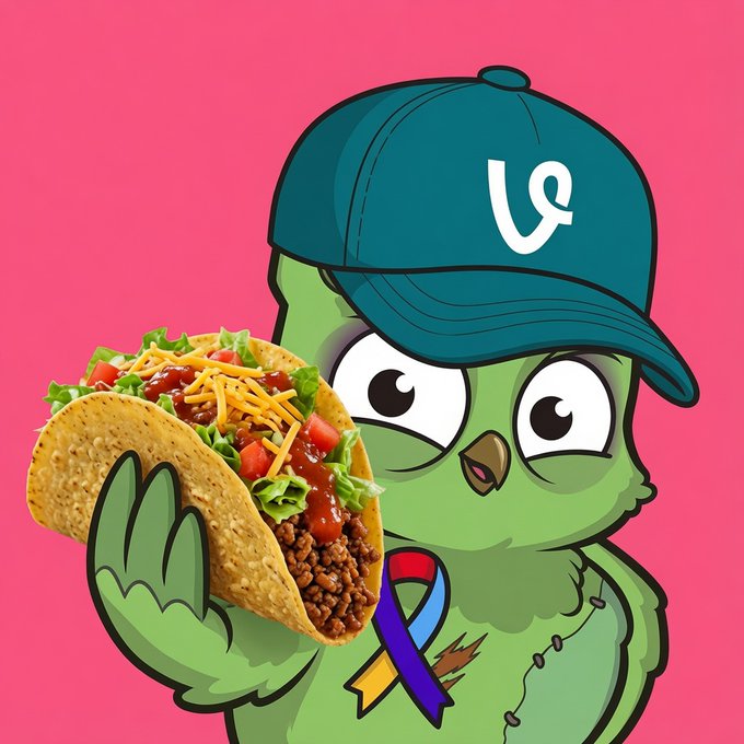 The image features a cartoon owl wearing a blue baseball cap, holding up a taco with lettuce, cheese, and tomatoes. The caption of the image reads "Good morning trenchers Enjoy taco tuesday Manifesting early start of new campaigns on @wallchain Meanwhile need to work on improving my X score!! Let'S go guys!! drop a gm back". This post seems to be promoting healthy eating habits or encouraging people to eat more vegetables, as indicated by the cartoon owl holding up a delicious-looking taco.