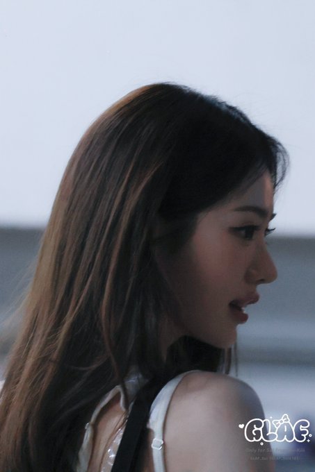 A side-profile portrait of a young woman with long brown hair, with a 'CLIZ' watermark in the corner.