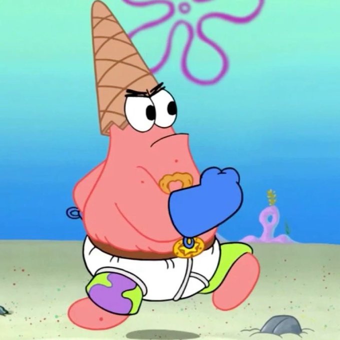 The image features Patrick Star from SpongeBob SquarePants wearing an ice cream cone hat and blue boxing gloves, strutting confidently on the sandy ocean floor. The cartoon character fits the post's "happy taco Tuesday" theme with Patrick's cheerful, empowered pose serving as a fun, wholesome visual to greet the day.