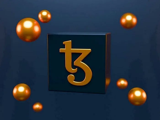 urn of gold balls surrounds a dark blue square with the letters "TZ" and "1" in gold, set against a black background.