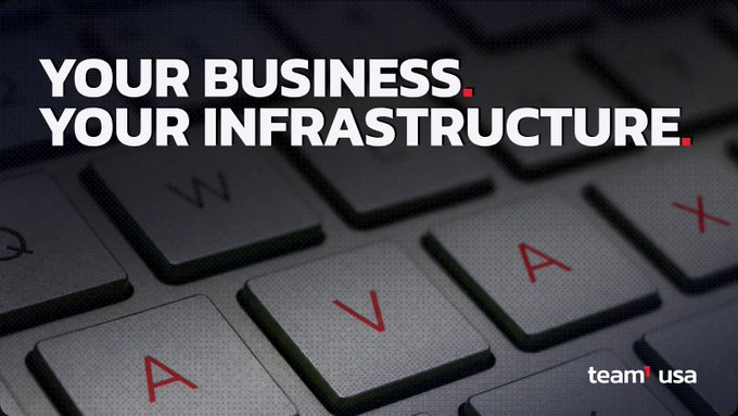 A promotional graphic with text 'YOUR BUSINESS. YOUR INFRASTRUCTURE.' overlaid on a keyboard with red letters, branded 'team usa' in the corner.