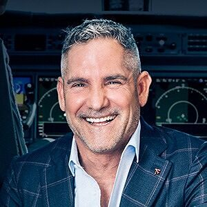 Grant Cardone, the real estate mogul, smiles inside what appears to be a private jet cockpit, fitting the accompanying post announcing his recent purchase of 40 BTC at $80,400.