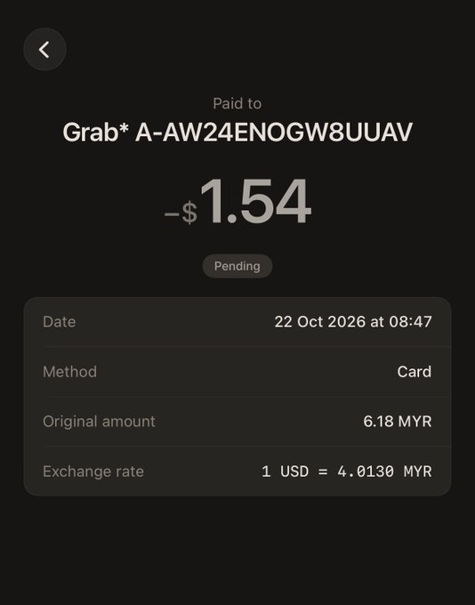 A dark-mode payment confirmation shows “Paid to Grab* A-AW24ENOGW8UUAV” for -$1.54, marked “Pending.” Details list 22 Oct 2026 at 08:47, Card, original amount 6.18 MYR, and exchange rate 1 USD = 4.0130 MYR.