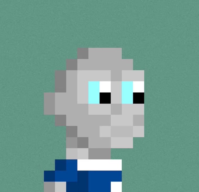 A pixel art illustration of a gray-skinned character with blue eyes and a dark blue outfit, rendered in a blocky, retro video game style.