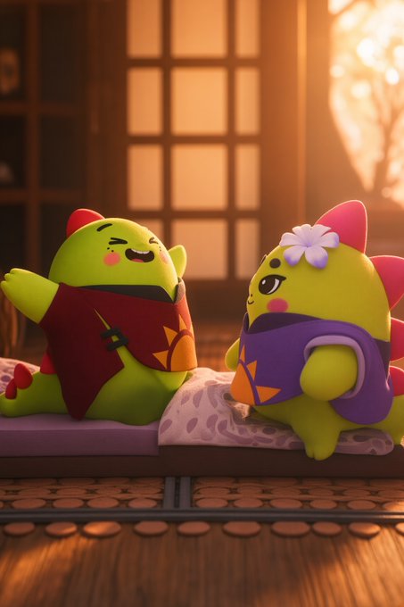 Two cute, round, dinosaur-like characters, one green with a red cape and one yellow with a purple shell and flower, are happily sitting in a cozy, warm-lit room.