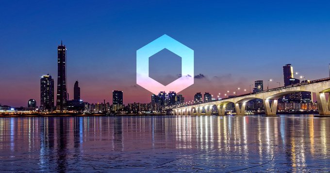 A twilight cityscape of Seoul features the Han River and Yeouido Bridge illuminated against a pink and blue sky, with the Chainlink (LINK) hexagon logo superimposed in the center. The image visually anchors the post's message about Chainlink choosing Korea—a market with deep retail crypto adoption, fast-moving banks, and proactive regulators—to demonstrate real-world on-chain finance.