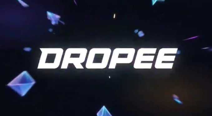 The image features a large, white sign with the word "DROPEE" written in black letters against a dark background. The sign is surrounded by numerous small blue triangles scattered throughout the frame, creating an interesting visual effect. The text on the sign reads "DROPEE", and it appears to be floating or hovering above the image due to its position relative to the surrounding elements.