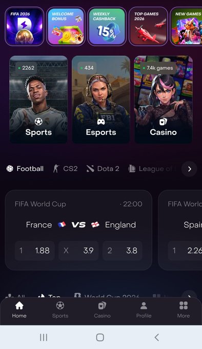 A mobile betting app interface displaying Sports, Esports, and Casino categories with promotional banners including FIFA 2026 and Weekly Cashback 15%, showing a FIFA World Cup match between France (1.88) and England (3.8).