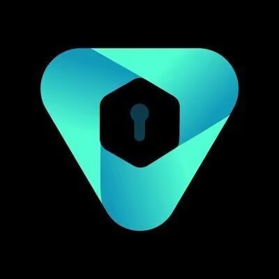 A stylized teal and blue logo featuring a shield-like emblem with a hexagonal keyhole at its center, set against a black background. The image appears to represent DataVLT (data vault), aligning with the post's thesis about the project's role in providing secure, verifiable data infrastructure for the growing AI and blockchain ecosystem.