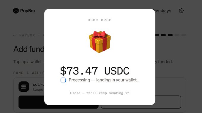 This image shows a MoonPay "PayBox" popup confirming a $73.47 USDC drop is processing and landing in the user's wallet, likely as part of the free airdrop mentioned in the post.