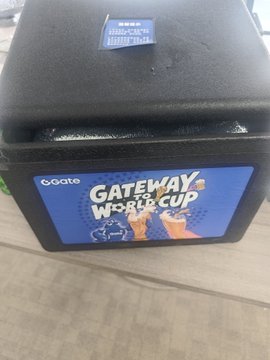 A black foam packaging box with a 'GATEWAY WORKCUP' label featuring the GoGate logo, likely containing merchandise.