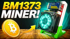 A promotional graphic for the 'BM1373 MINER!' Bitcoin ASIC device, showing the miner unit alongside a gold Bitcoin coin.