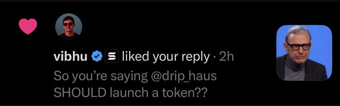 A Twitter/X notification showing a user named 'vibhu' liked a reply, with the text reading 'So you're saying @drip_haus SHOULD launch a token??' alongside an image of a man with glasses.