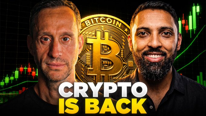 The image is a YouTube thumbnail featuring two men flanking a large golden Bitcoin logo, with bold text reading "CRYPTO IS BACK" set against a background of green and red candlestick charts. It promotes a live stream discussing Bitcoin's test of the $80K price level amid growing Wall Street bullishness on crypto.