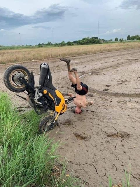 The image shows a man lying face down on his back with his head above the ground, surrounded by mud and grass. A motorcycle is upside down next to him, indicating that he might have fallen off while riding or attempting to perform a stunt. The photo also includes text that reads "ZCash has turned into ZCrash haha". This suggests that the man's fall could be related to an attempt at a stunt on his motorcycle, and it seems like they both ended up in a humorous situation.

The image is accompanied by a caption that provides context about the post being shared on social media platforms.