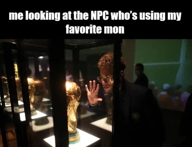 urns of gold and silver, framed by black glass, display a golden trophy with the text "me looking at the NPC who's using my favorite mon"