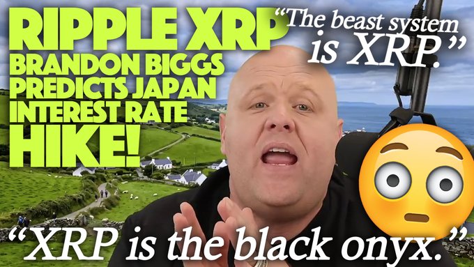 The image shows a YouTube thumbnail featuring a bald man enthusiastically speaking, with bold yellow text reading "RIPPLE XRP BRANDON BIGGS PREDICTS JAPAN INTEREST RATE HIKE!" alongside quoted phrases "The beast system is XRP" and "XRP is the black onyx." A surprised emoji is overlaid on the right side, visually emphasizing the post's reaction to Brandon Biggs' recent bold XRP-related statements following his accurate prediction of Japan's interest rate hike.